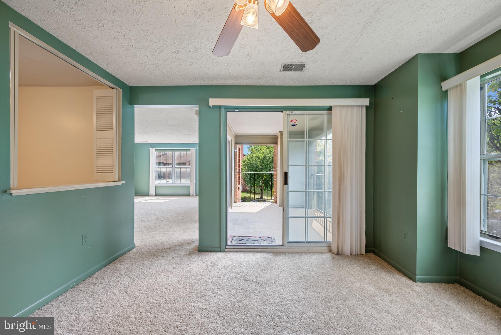 2201 Woodbox Lane, Unit 2201B Baltimore, MD 21209 - Photo 7 of 45 a view of an empty room and window