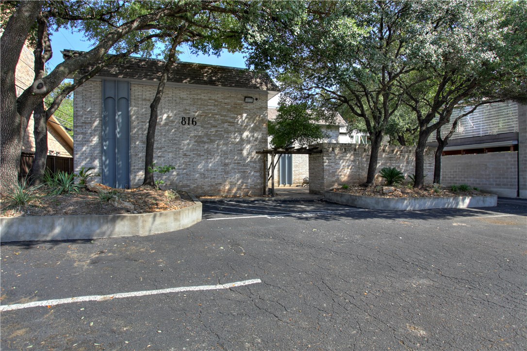 816 West N Loop Boulevard, Unit 106 Austin, TX 78756 - Photo 2 of 21 a view of a house with a street