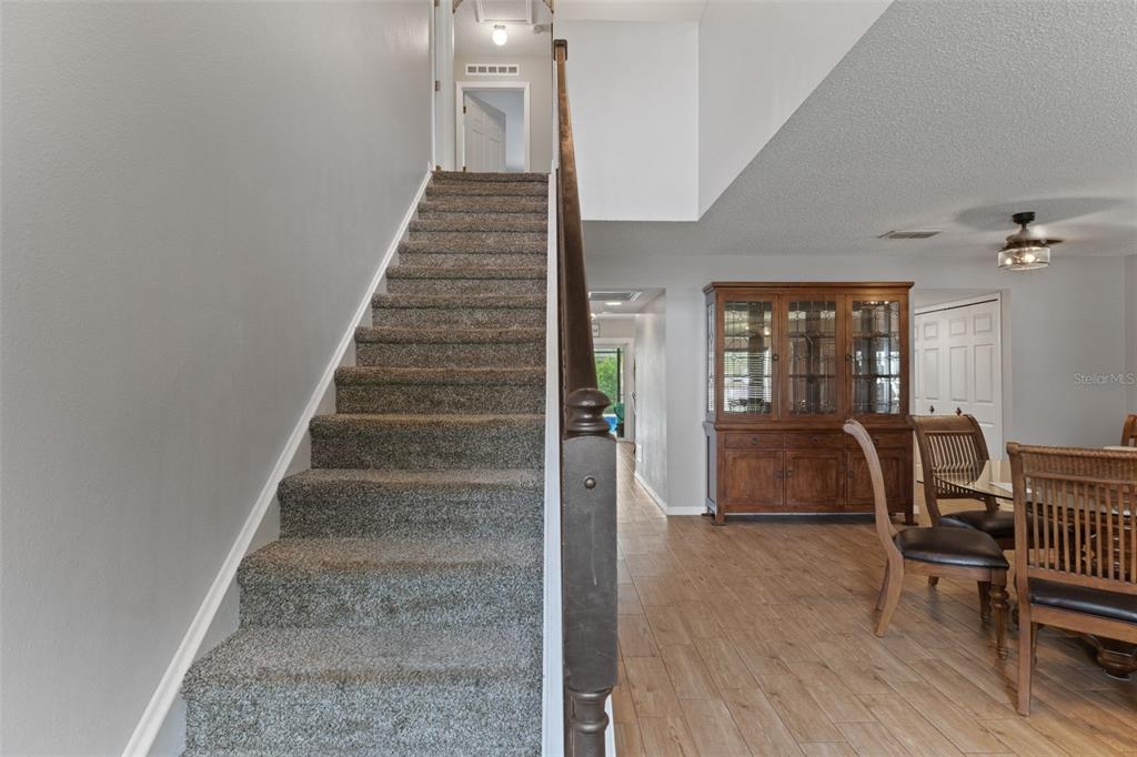2451 Deltona Boulevard Spring Hill, FL 34606 - Photo 21 of 68 a view of entryway and hall with wooden floor