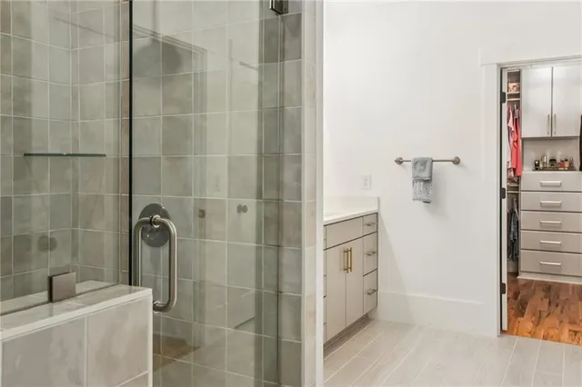 a bathroom with a bathtub and a shower