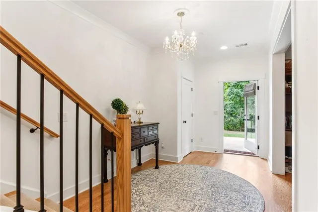 a view of a balcony with table and chairs