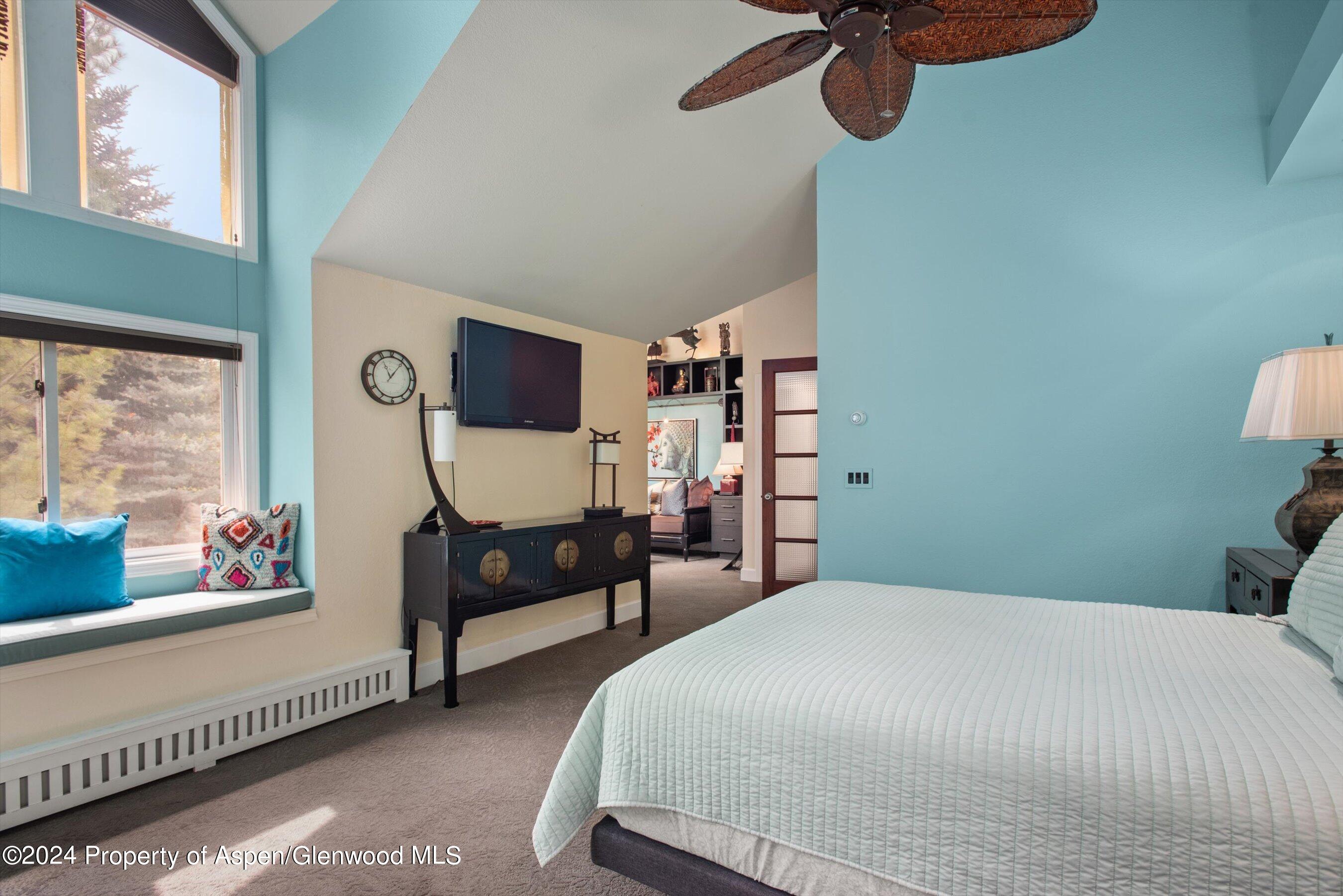 153 Wren Court Basalt, CO 81621 - Photo 12 of 21 a bedroom with a bed and a window