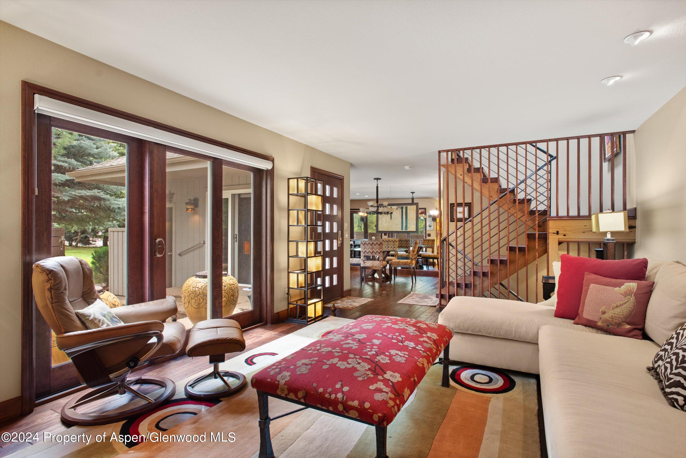 153 Wren Court Basalt, CO 81621 - Photo 4 of 21 a living room with furniture and large windows