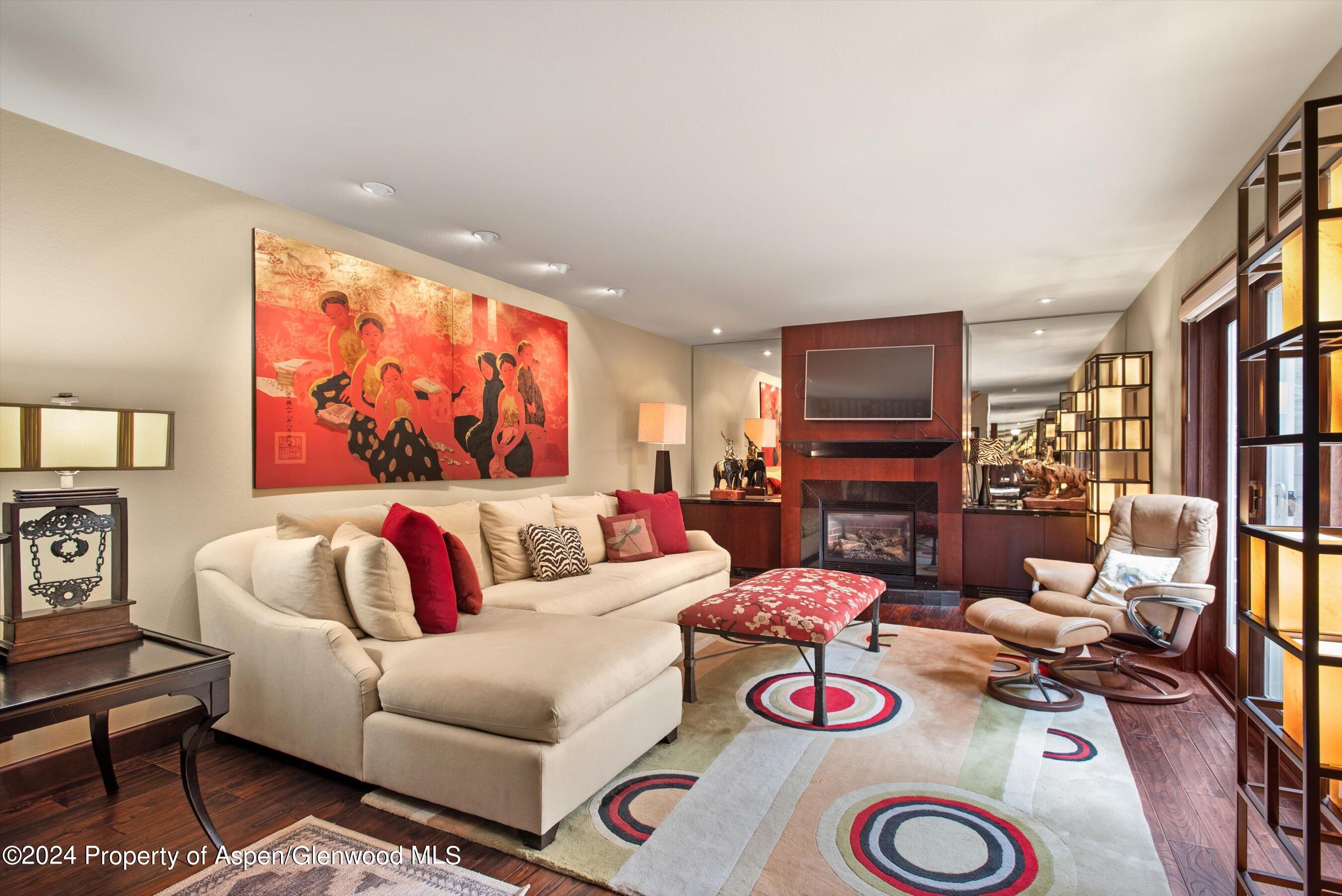 153 Wren Court Basalt, CO 81621 - Photo 5 of 21 a living room with furniture and a flat screen tv with rug