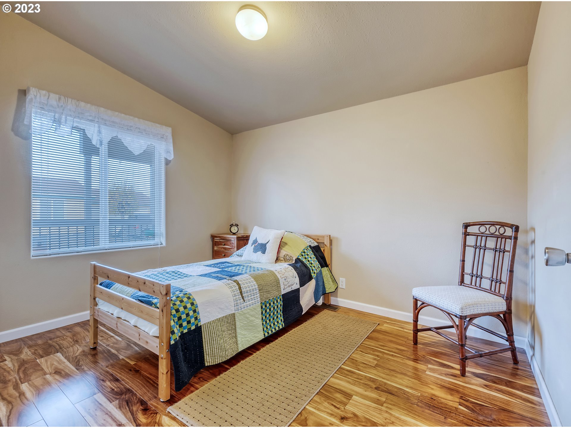 2601 Maia Loop Springfield, OR 97477 - Photo 20 of 29 a bedroom with a bed and a table