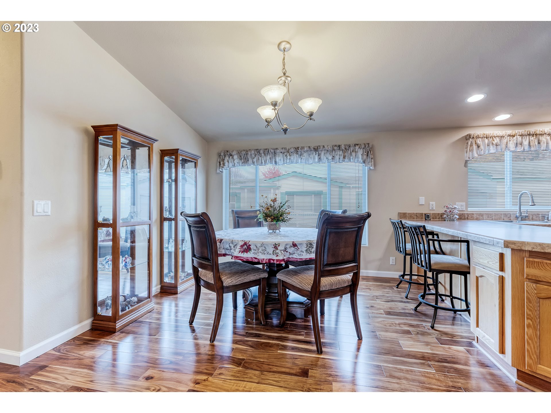 2601 Maia Loop Springfield, OR 97477 - Photo 8 of 29 a view of a dining room with furniture and wooden floor