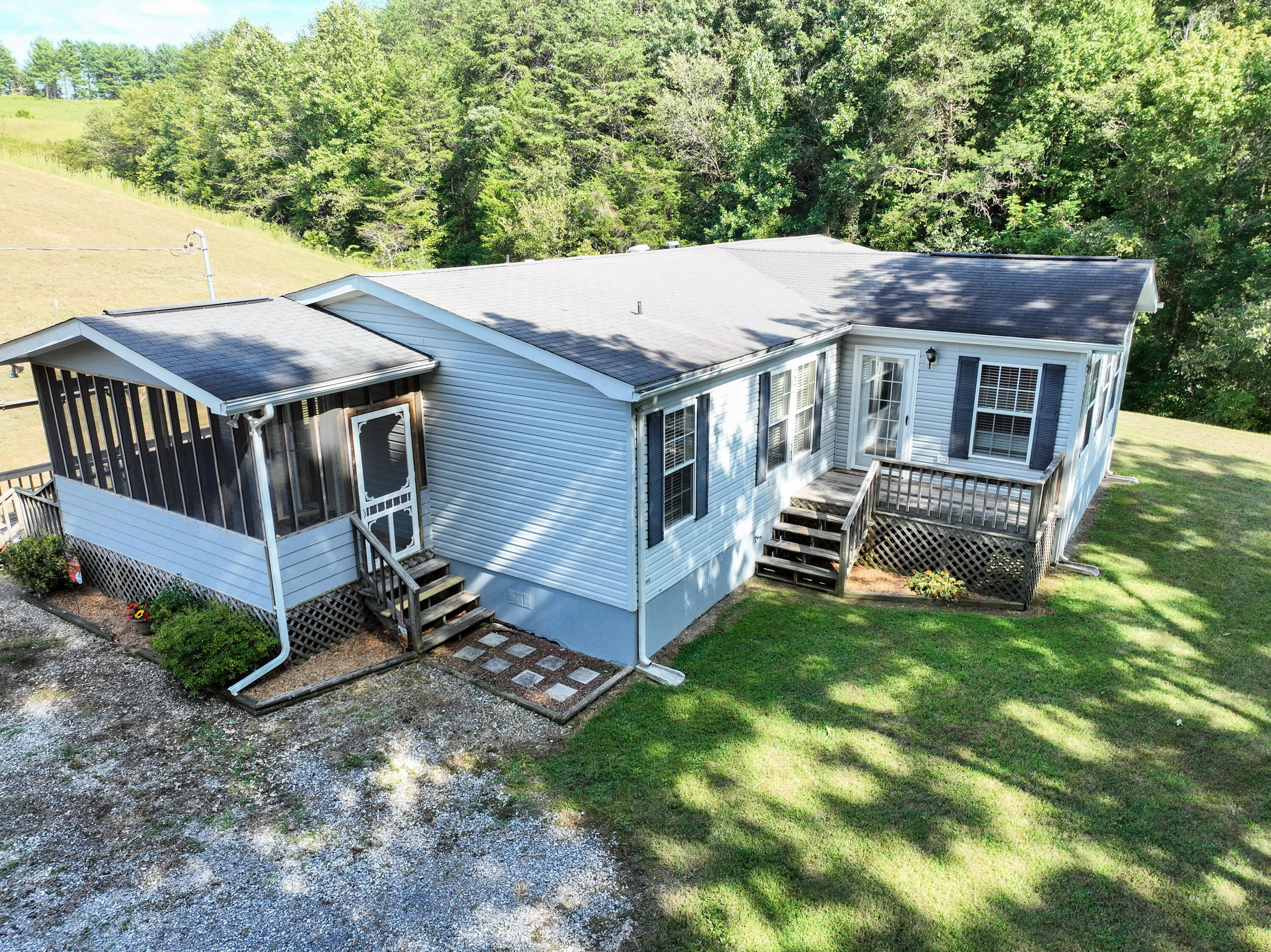 2090 Chimney Top Loop Fall Branch, TN 37656 - Photo 1 of 45 Front & Side Entrance