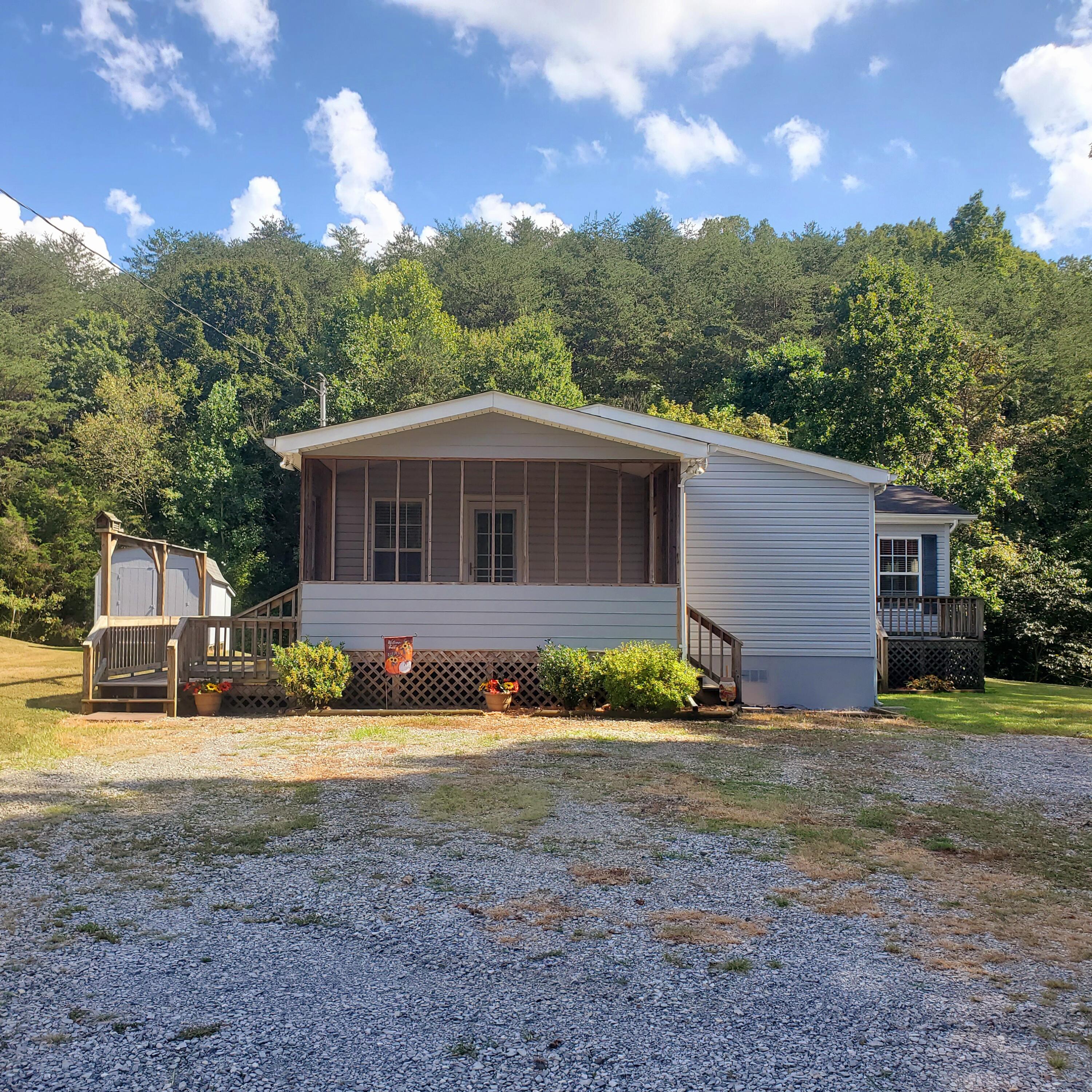 2090 Chimney Top Loop Fall Branch, TN 37656 - Photo 3 of 45 Side Entrance