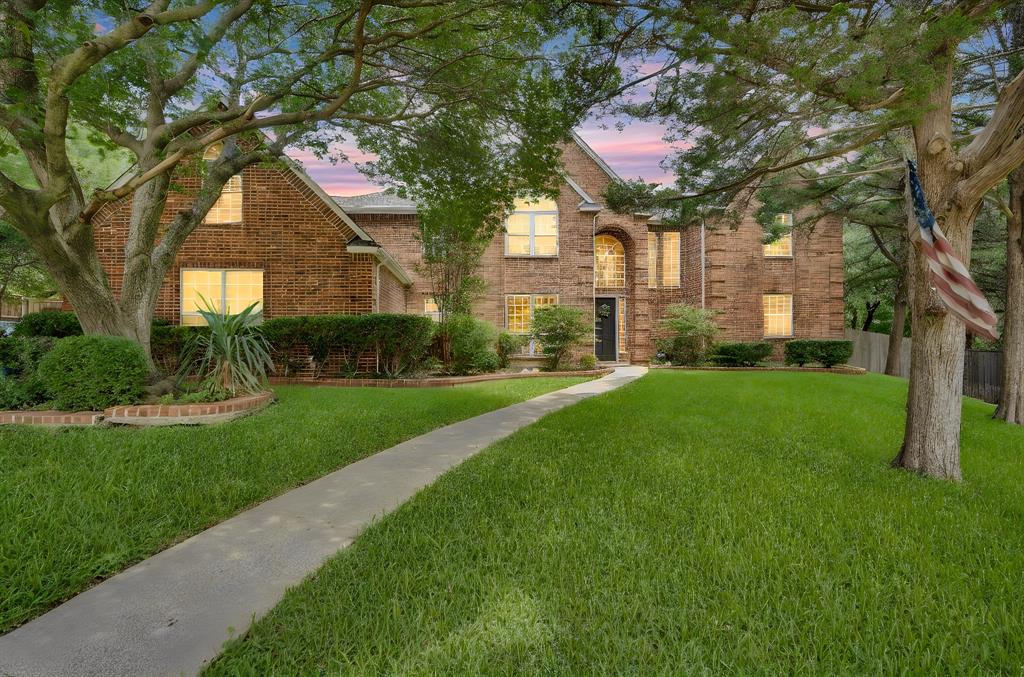 1907 Timber Ridge Court Cedar Hill, TX 75104 - Photo 3 of 30 Brick exterior featuring multiple gables and an arched entry