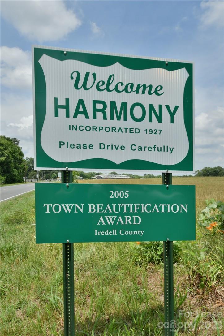115 Buckhead Road, Unit 111 Harmony, NC 28634 - Photo 4 of 19 a sign on the side of the road