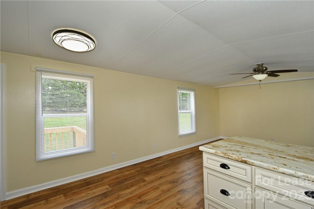 115 Buckhead Road, Unit 111 Harmony, NC 28634 - Photo 6 of 19 an empty room with windows