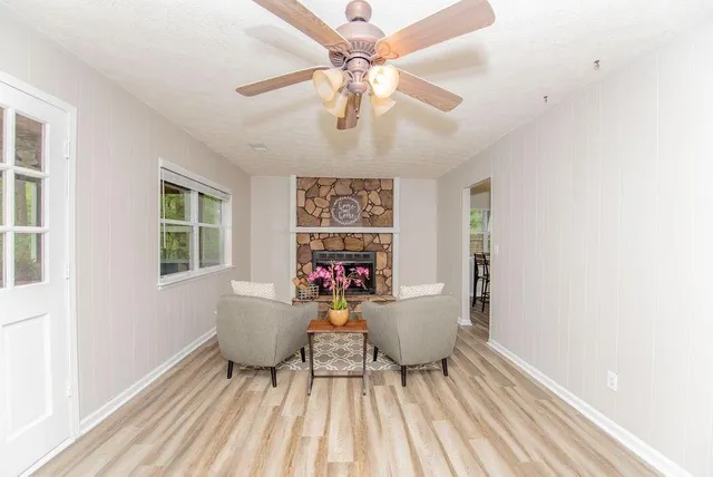 a living room with furniture and a window