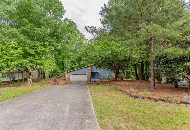 a view of a house with swimming pool