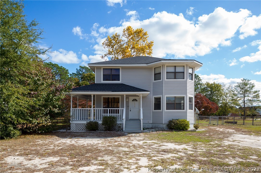4629 Legion Road Hope Mills, NC 28348 - Photo 1 of 21 a view of a house with a yard
