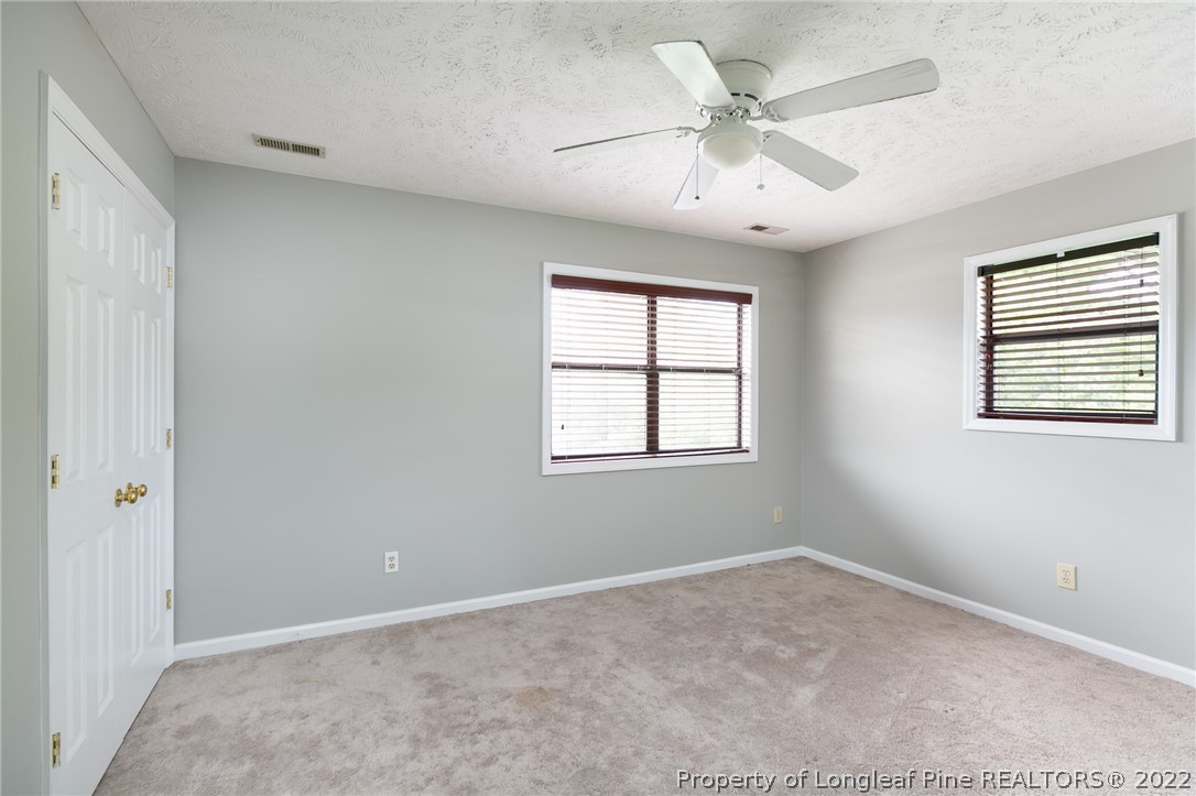 4629 Legion Road Hope Mills, NC 28348 - Photo 14 of 21 a view of an empty room with a window