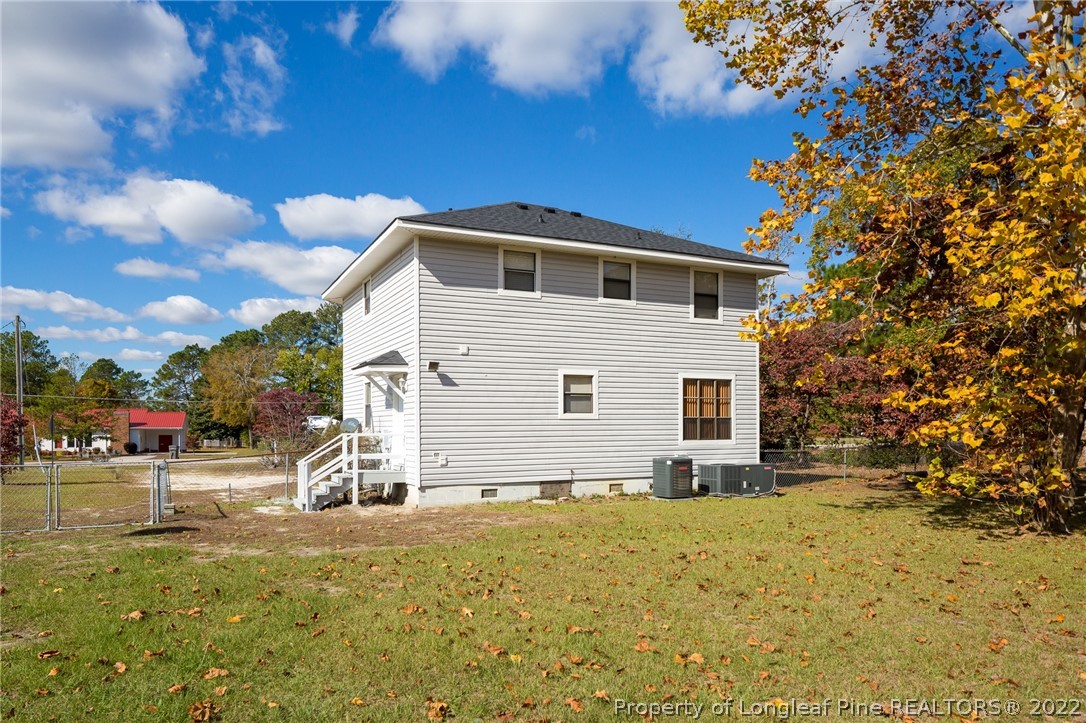 4629 Legion Road Hope Mills, NC 28348 - Photo 20 of 21 a view of a house with a yard