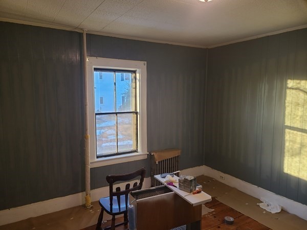 96 East Street Ware, MA 01082 - Photo 7 of 10 a bedroom with a bed and a window