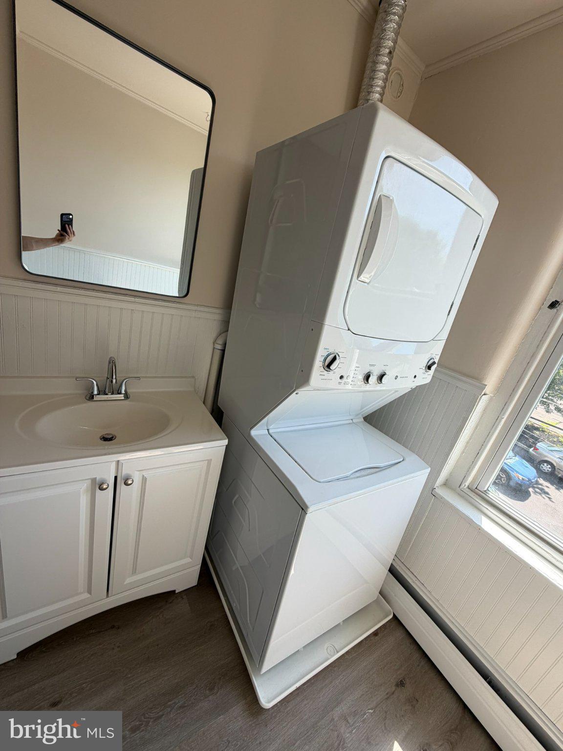 20 South 8th Street, Unit 2 Perkasie, PA 18944 - Photo 9 of 10 Compact laundry area with modern appliances.