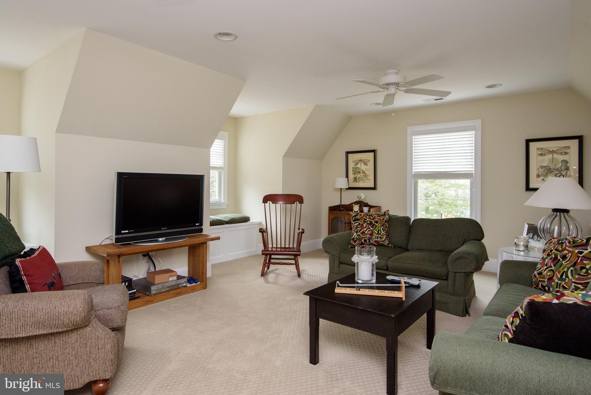 708 Black Forest Road Annapolis, MD 21409 - Photo 42 of 82 a living room with furniture and a flat screen tv