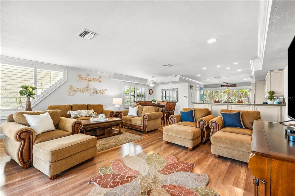 548 Beach Road, Unit 540A Sarasota, FL 34242 - Photo 13 of 77 a living room with furniture and a large window