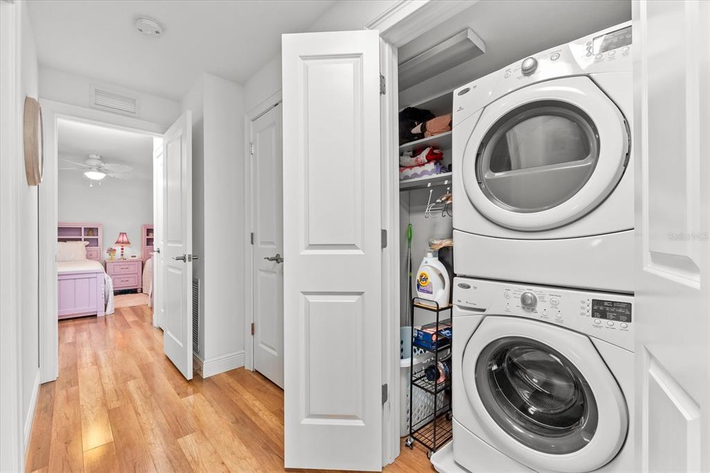 548 Beach Road, Unit 540A Sarasota, FL 34242 - Photo 26 of 77 a view of a hallway with washer and dryer