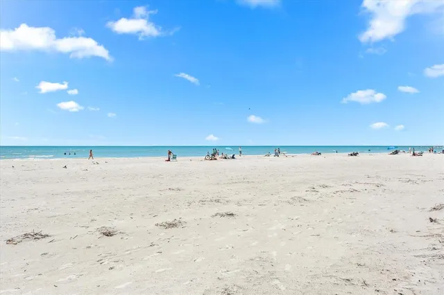a view of a swimming pool with a backyard