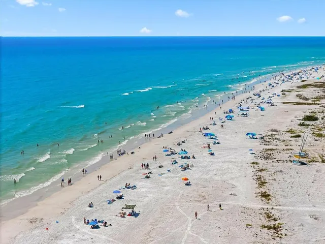 a view of a city with lawn chairs