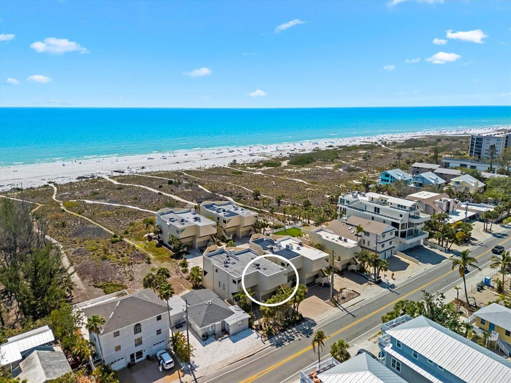 548 Beach Road, Unit 540A Sarasota, FL 34242 - Photo 49 of 77 an aerial view of residential houses with outdoor space