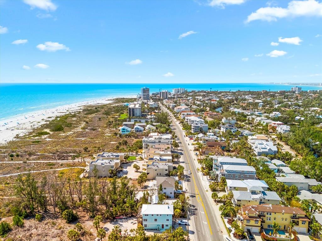 548 Beach Road, Unit 540A Sarasota, FL 34242 - Photo 51 of 77 an aerial view of residential building and ocean