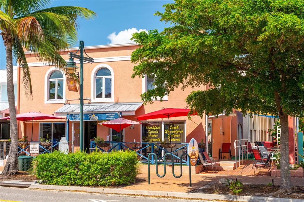 548 Beach Road, Unit 540A Sarasota, FL 34242 - Photo 59 of 77 a view of the a cafe with sitting area