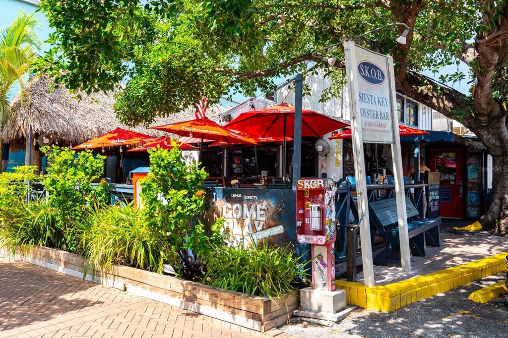 548 Beach Road, Unit 540A Sarasota, FL 34242 - Photo 60 of 77 an outdoor space with swimming pool and furniture