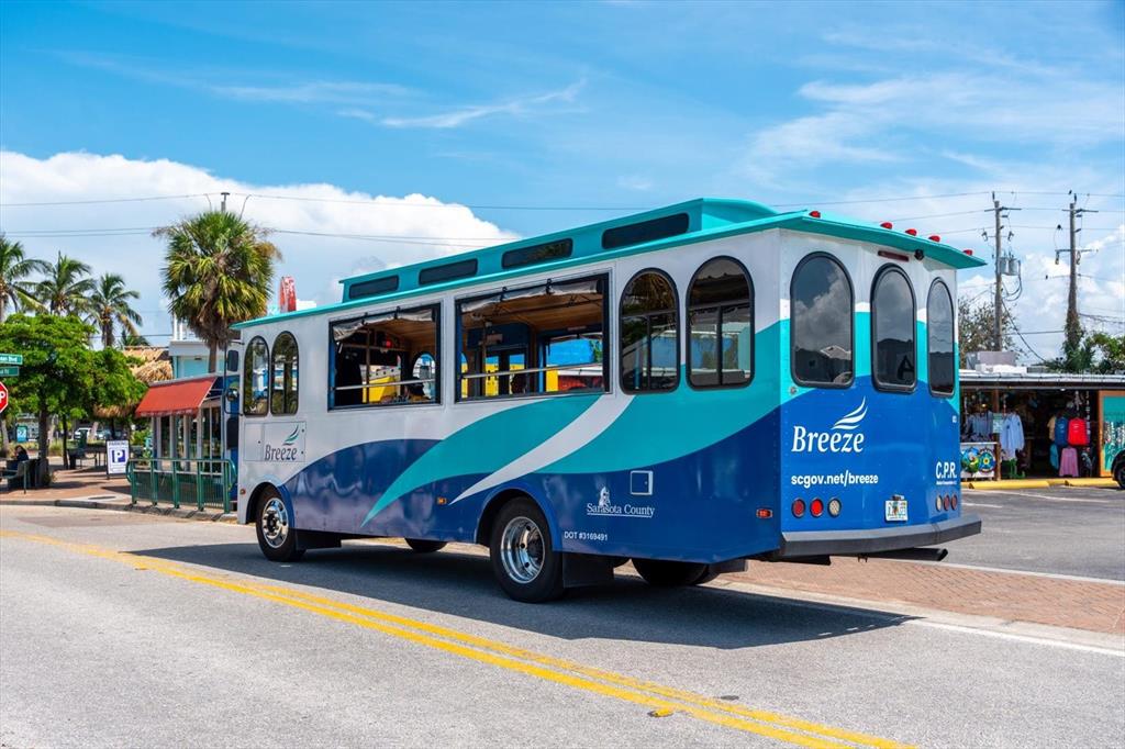 548 Beach Road, Unit 540A Sarasota, FL 34242 - Photo 70 of 77 a car parked in front of a building