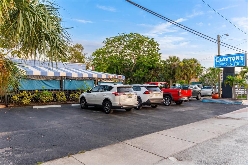 548 Beach Road, Unit 540A Sarasota, FL 34242 - Photo 77 of 77 a view of a cars parked in front of a house