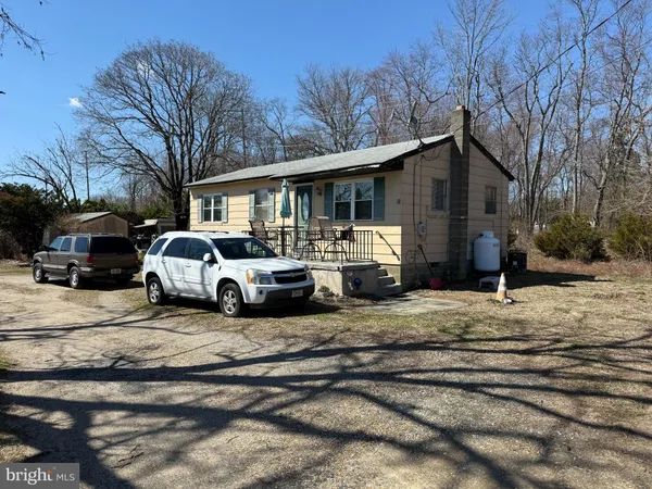 a car parked in front of a house