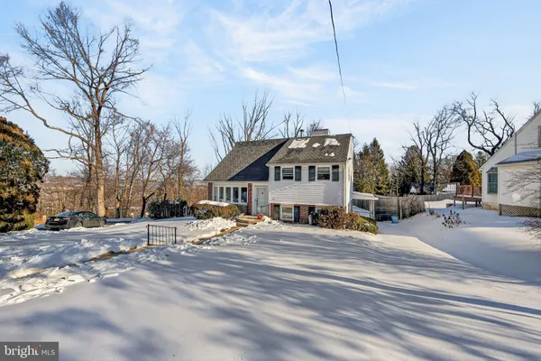 a front view of a house with patio