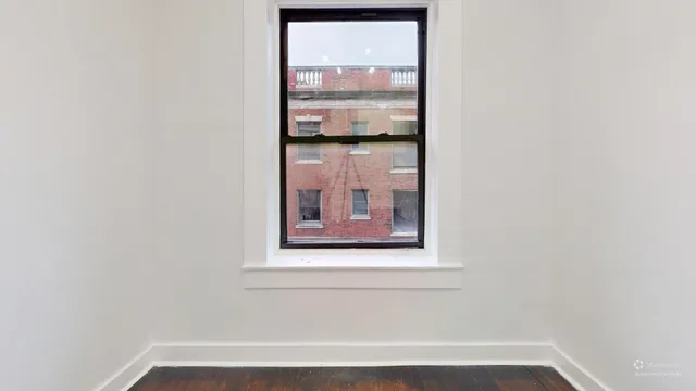 a view of a small space with window