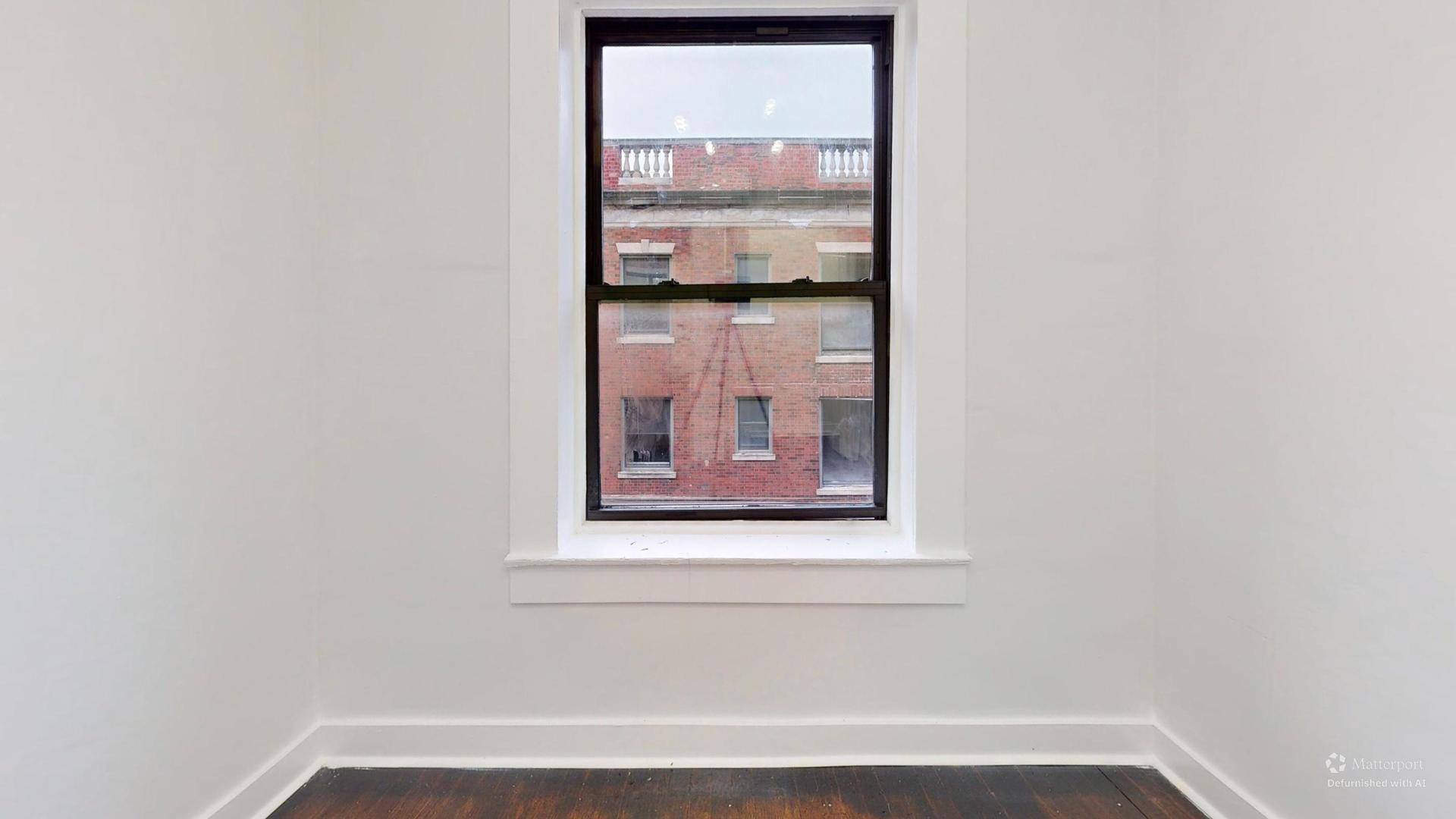 2401 East 75th Street, Unit 3 Chicago, IL 60649 - Photo 7 of 14 a view of a small space with window