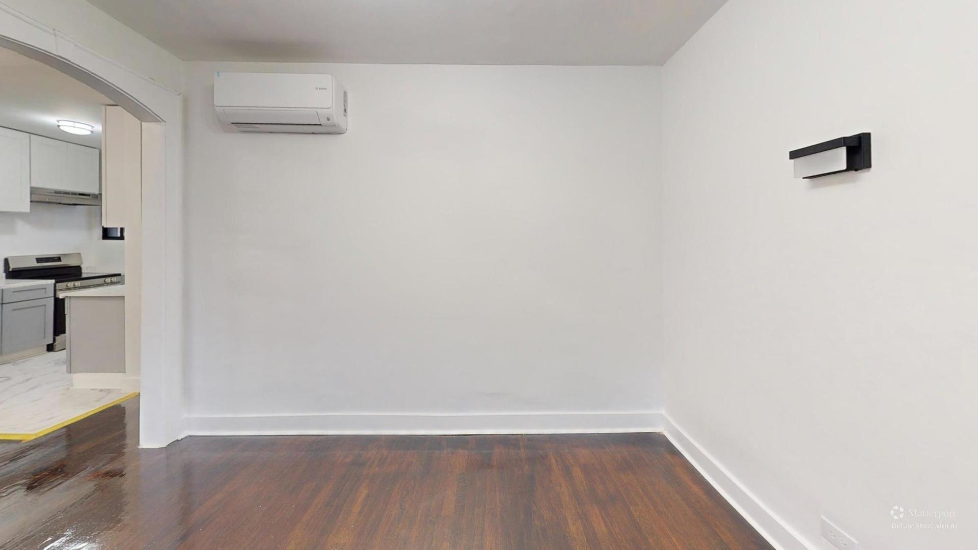 2401 East 75th Street, Unit 3 Chicago, IL 60649 - Photo 9 of 14 a view of wooden floor