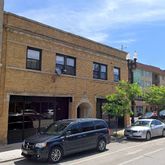 a car parked in front of a building