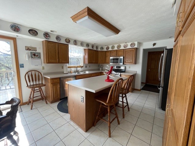 647 Redbank Road Templeton, PA 16259 - Photo 8 of 53 a kitchen with stainless steel appliances a table and chairs in it