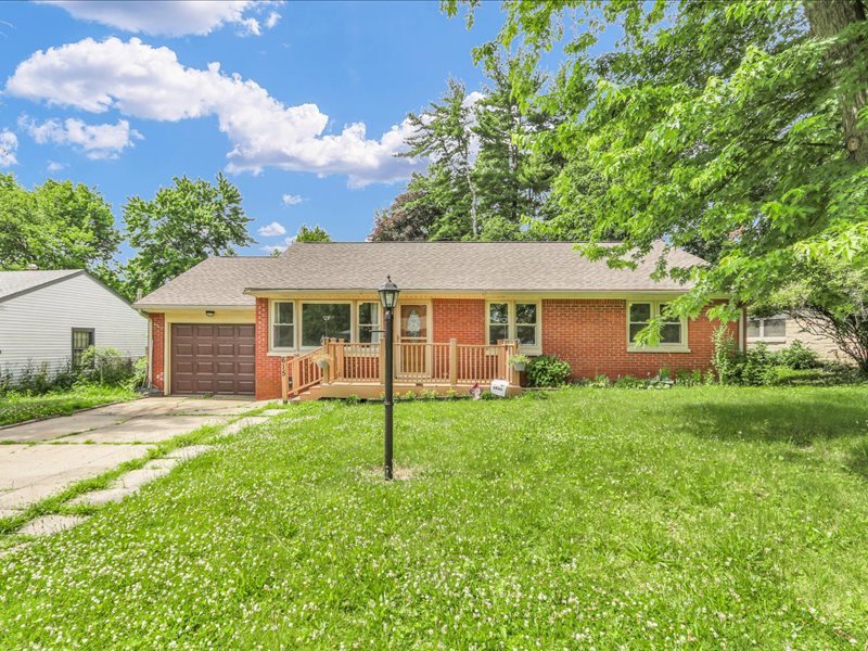 front view of a house and a yard