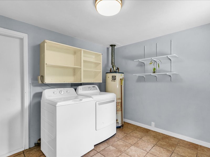 615 Breen Drive Champaign, IL 61820 - Photo 13 of 29 a utility room with dryer and washer