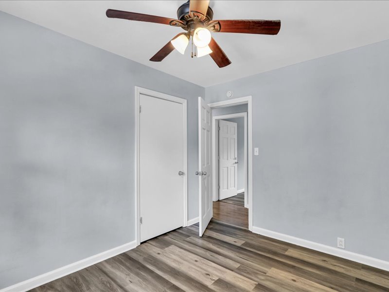 615 Breen Drive Champaign, IL 61820 - Photo 20 of 29 an empty room with closet and a ceiling fan
