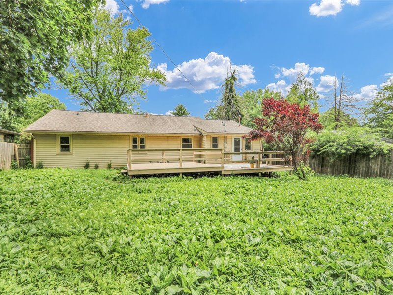 615 Breen Drive Champaign, IL 61820 - Photo 27 of 29 a front view of a house with garden
