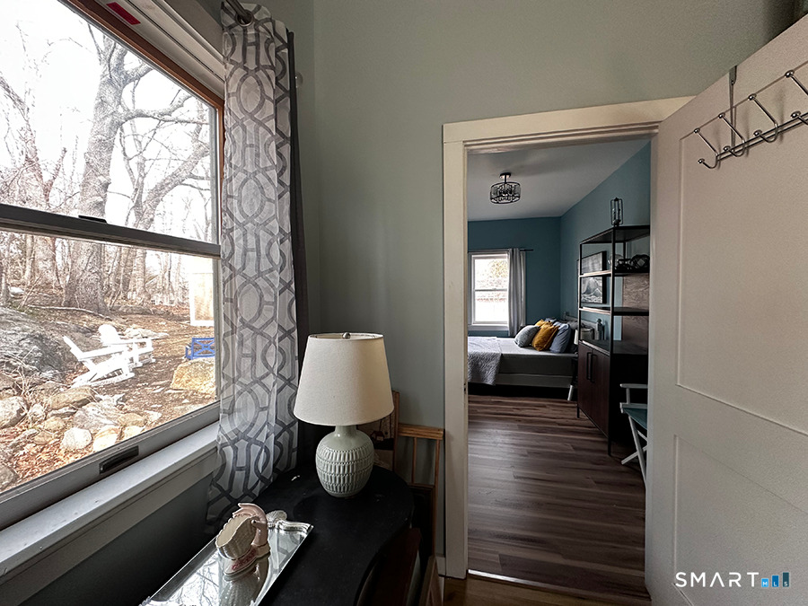 79 Wesley Avenue Westbrook, CT 06498 - Photo 22 of 33 a living room with furniture and a window