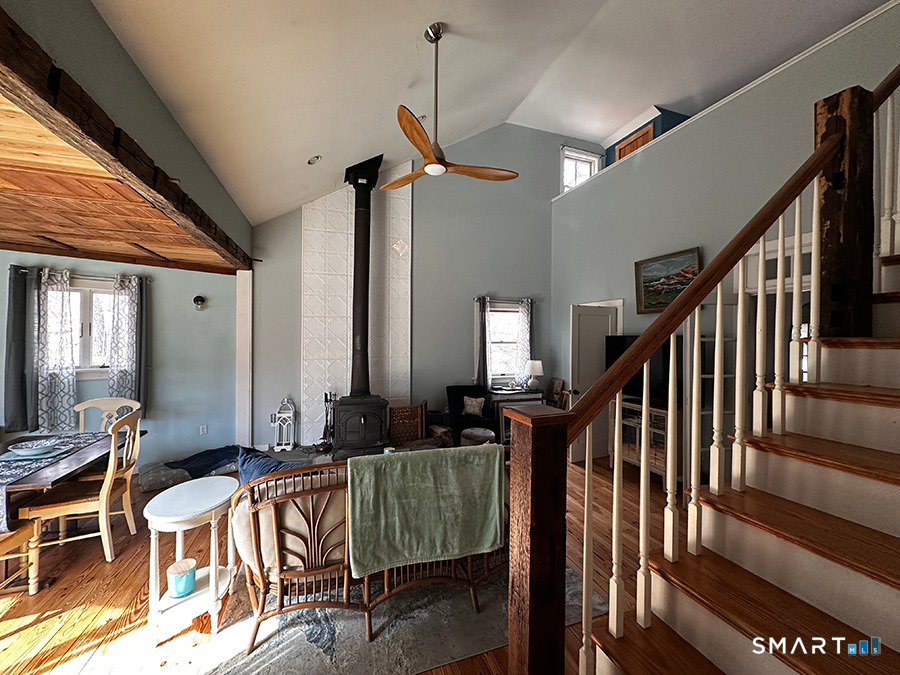 79 Wesley Avenue Westbrook, CT 06498 - Photo 27 of 33 a view of an entryway with wooden floor and windows