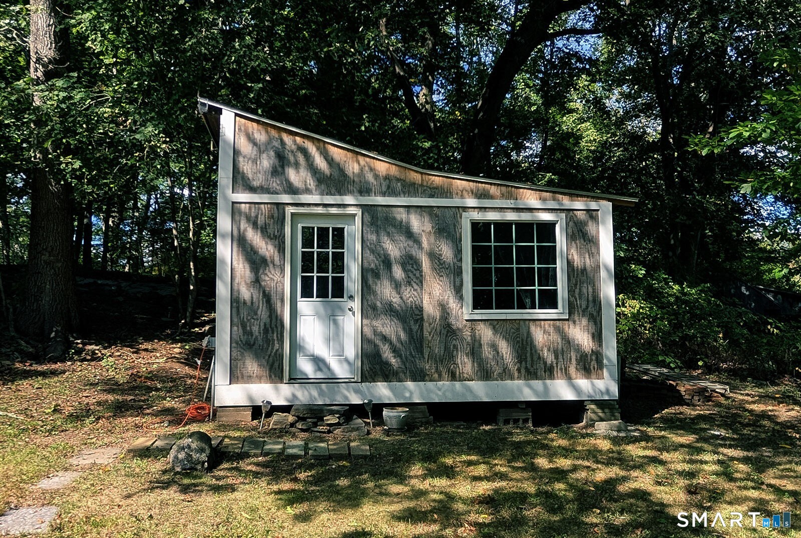 79 Wesley Avenue Westbrook, CT 06498 - Photo 3 of 33 a front view of house with yard
