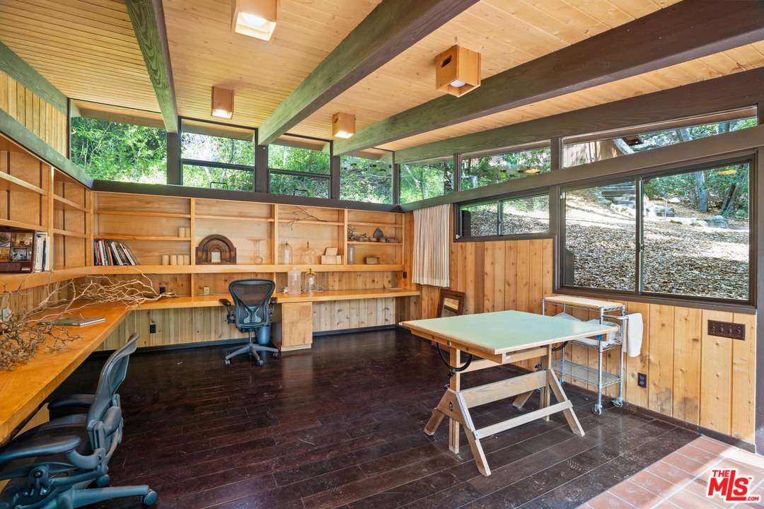 481 Cold Canyon Road Calabasas, CA 91302 - Photo 15 of 44 a view of a chairs and table in the balcony