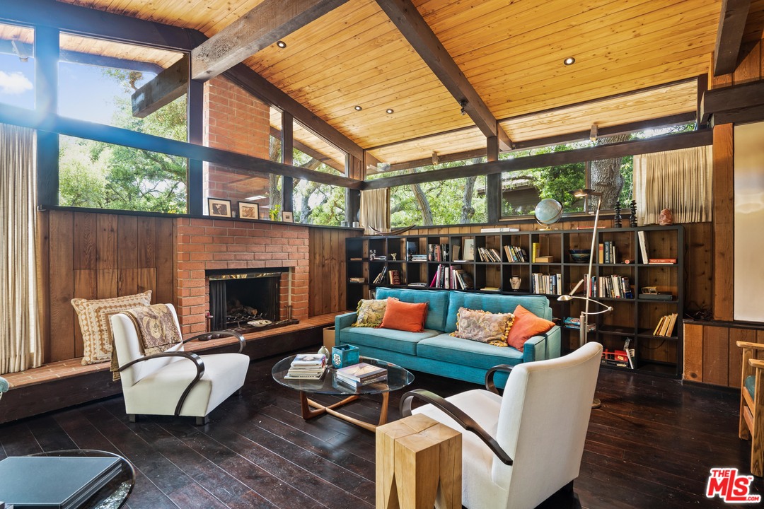 481 Cold Canyon Road Calabasas, CA 91302 - Photo 23 of 44 a outdoor living space with patio furniture and a fireplace