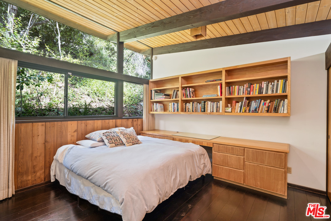 481 Cold Canyon Road Calabasas, CA 91302 - Photo 33 of 44 a bedroom with a bed and a window